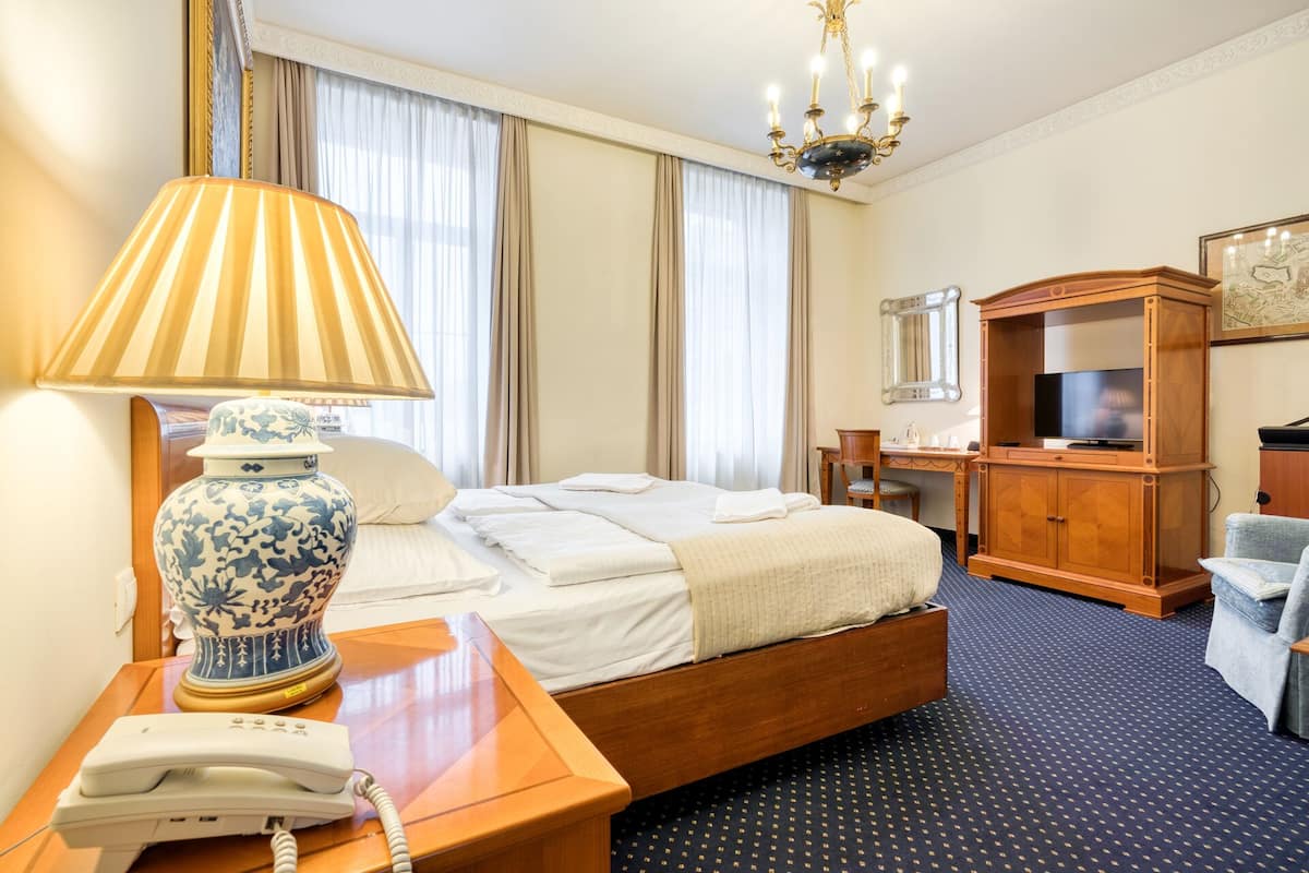 Premium bedding, down duvets, desk, laptop workspace