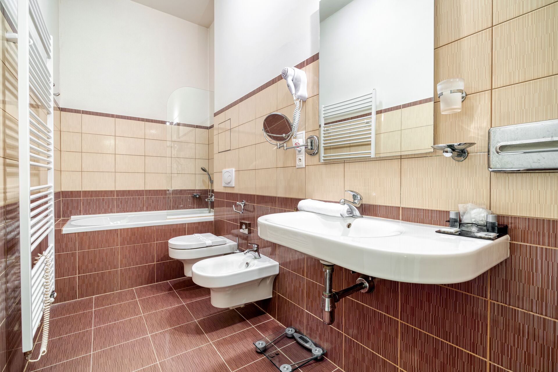 free toiletries, hair dryer, bidet, towels