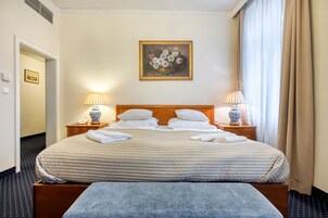 Premium bedding, down comforters, desk, laptop workspace