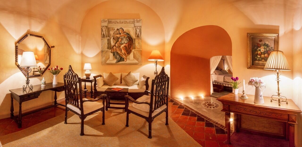 presidential room, 1 king bed | living area | 42-inch plasma tv with satellite channels, tv