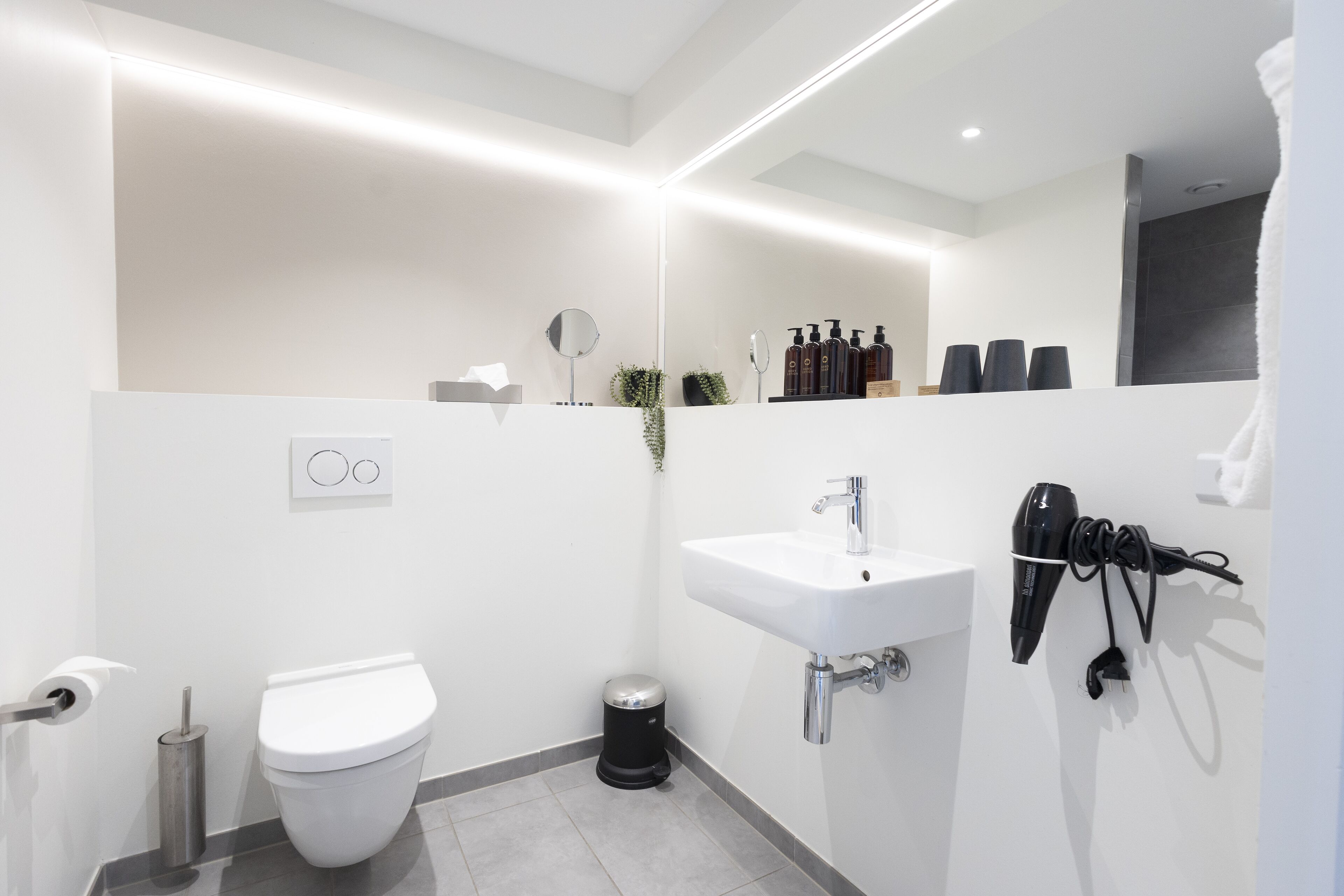 shower, hair dryer, heated floors, towels