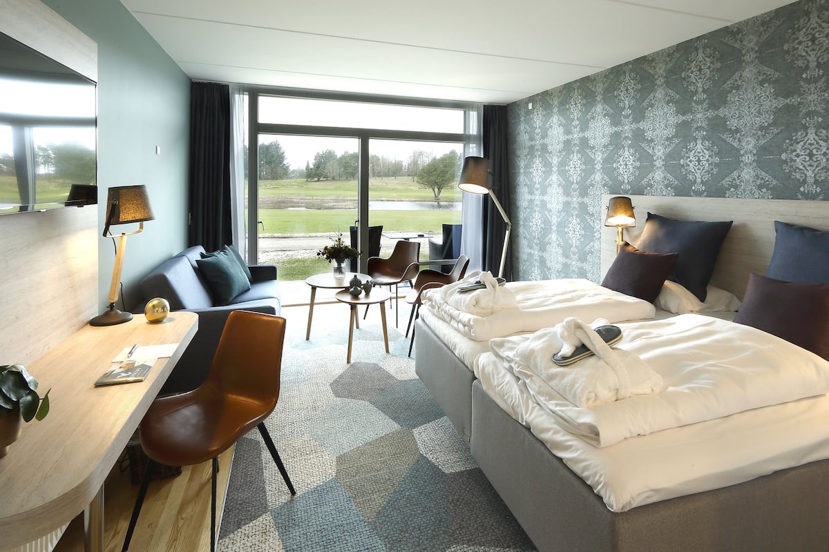 superior room, golf view | 1 bedroom, minibar, in-room safe, desk