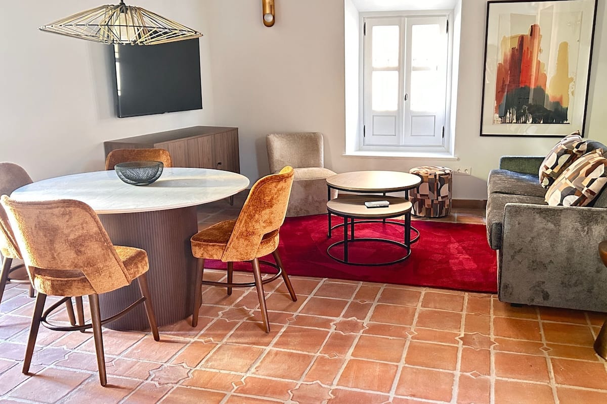 Exclusive Apartment | Living area | 50-inch flat-screen TV with digital channels, TV