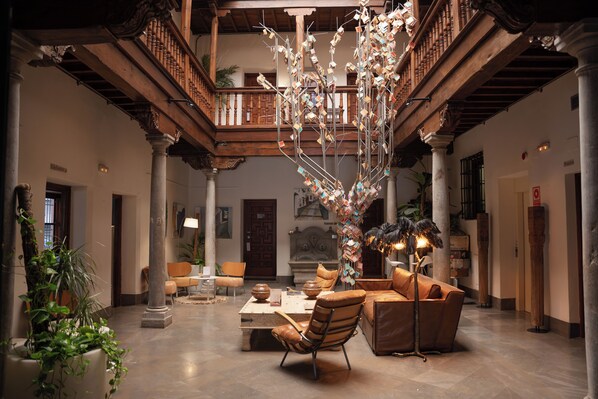 Televisión de pantalla plana y estación para iPod