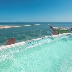 Seasonal outdoor pool, pool umbrellas, pool loungers