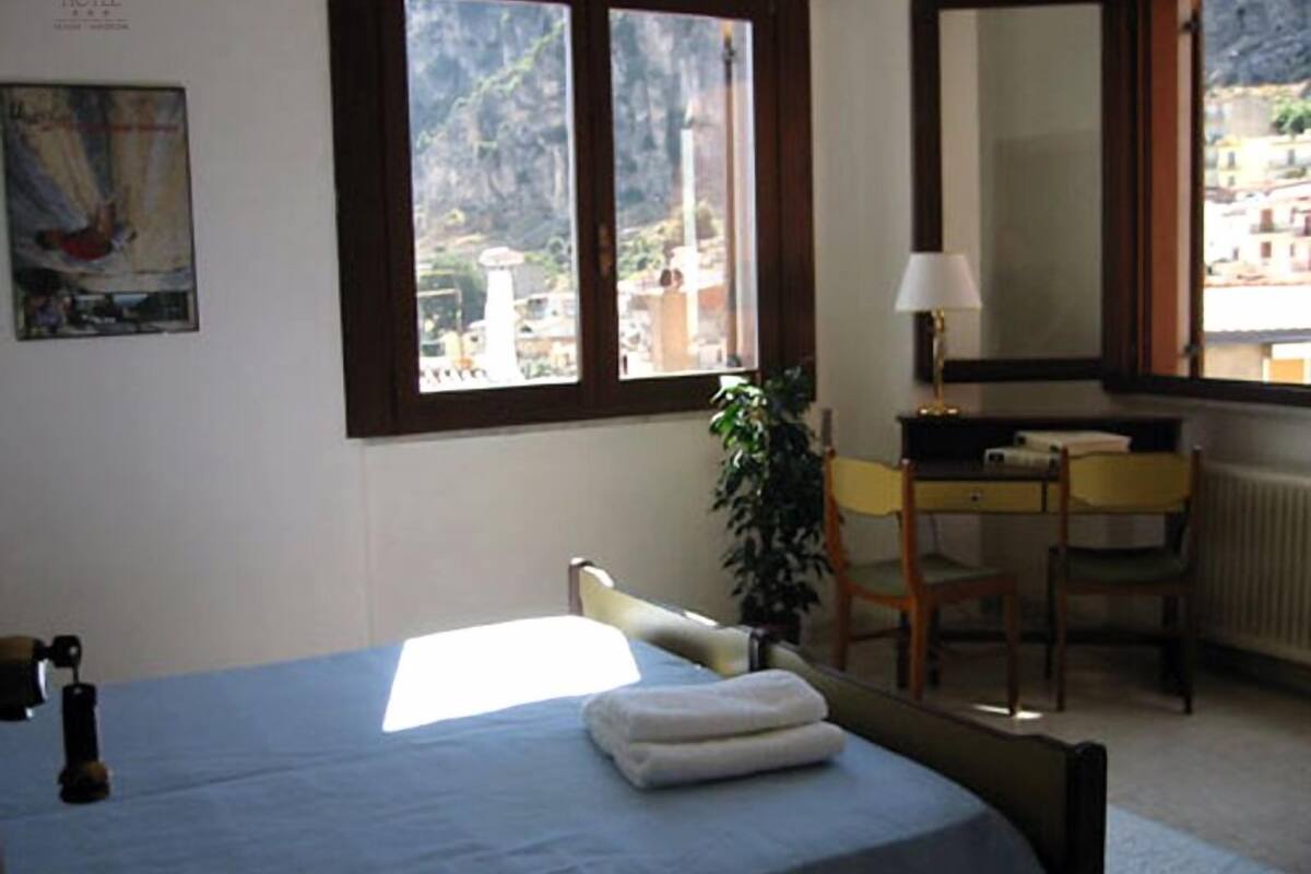 double or twin room | in-room safe, desk, blackout curtains, iron/ironing board