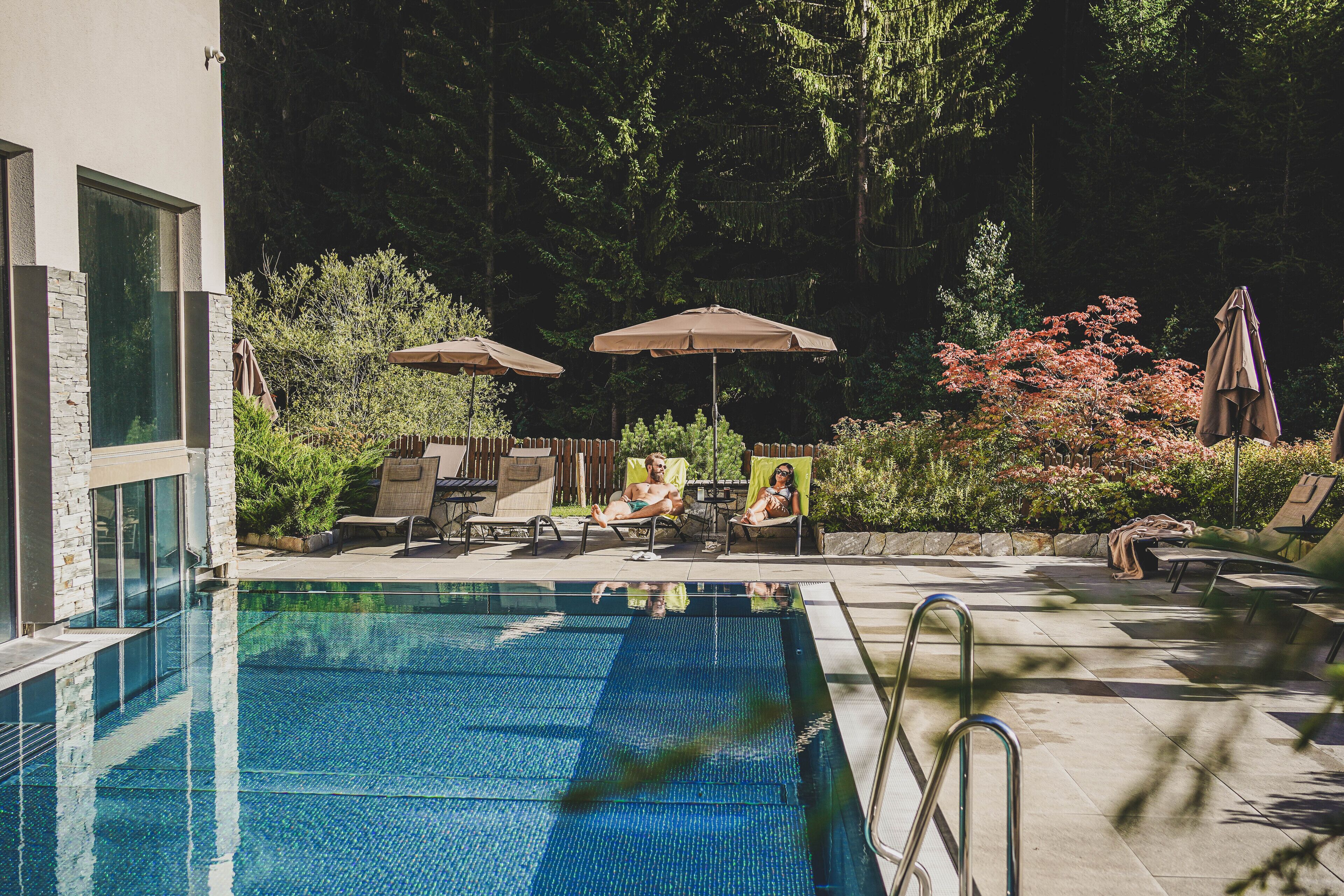 indoor pool, outdoor pool, open 7:30 am to 10 pm, pool umbrellas