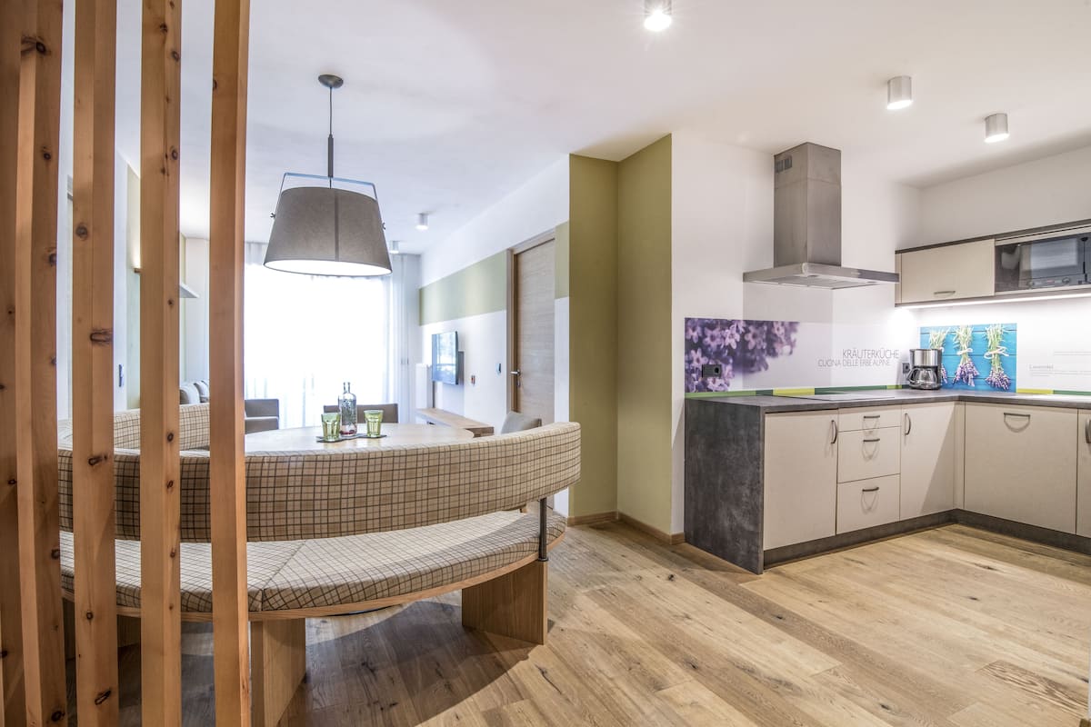 Apartment, 2 Bedrooms | Living area | 55-inch TV with satellite channels