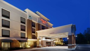 A hotel with a clear sign reading "Hampton Inn." - Hampton Inn Rochester Webster (Webster)