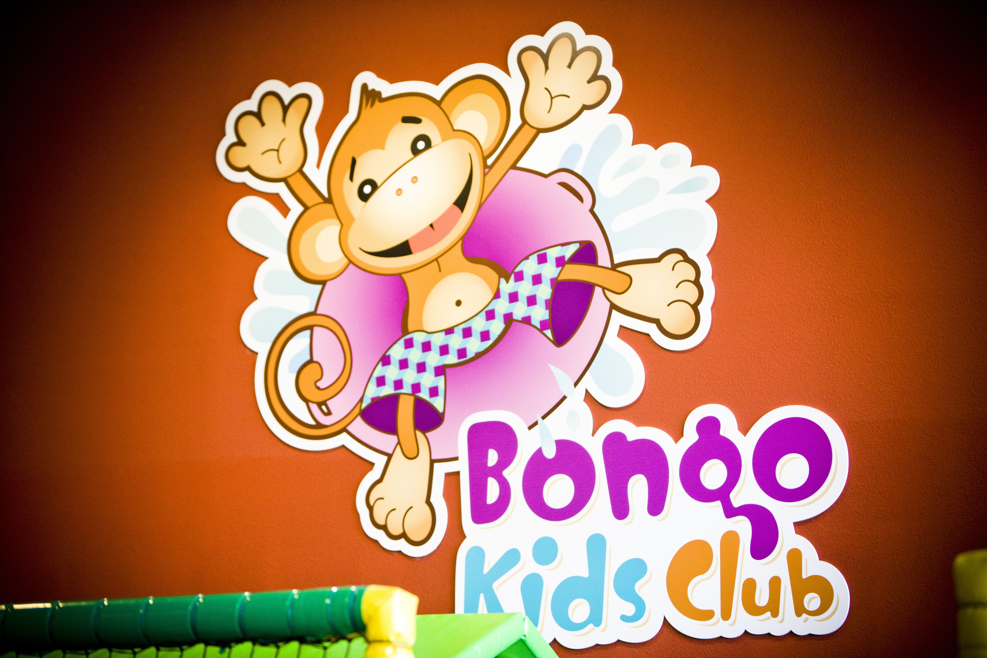 A sticker of a cartoon monkey with the text "Bongo Kids Club".