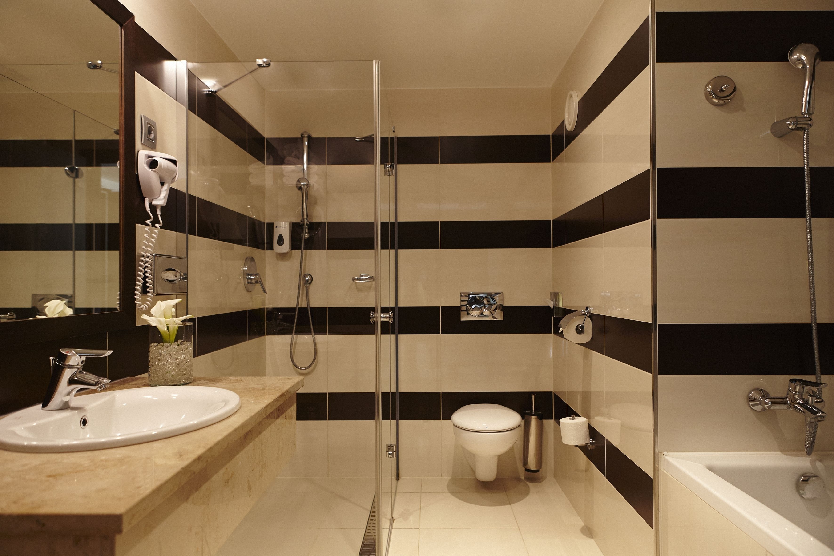 junior suite | bathroom | hair dryer, bathrobes, towels