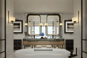 Separate tub and shower, rainfall showerhead, free toiletries