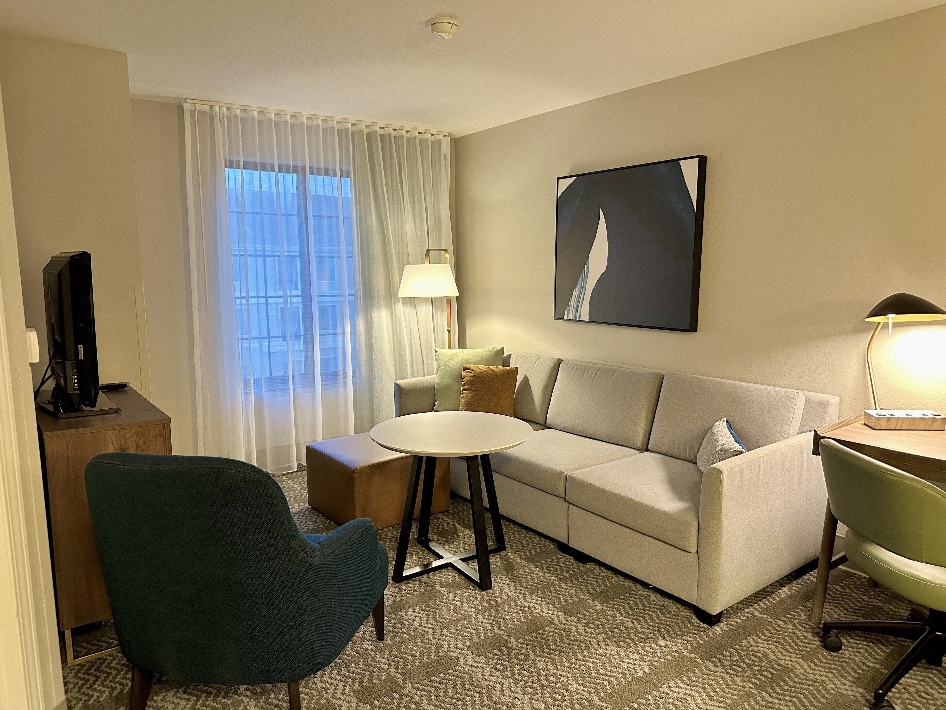 premium bedding, desk, blackout curtains, iron/ironing board