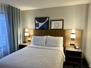 Premium bedding, desk, blackout drapes, iron/ironing board