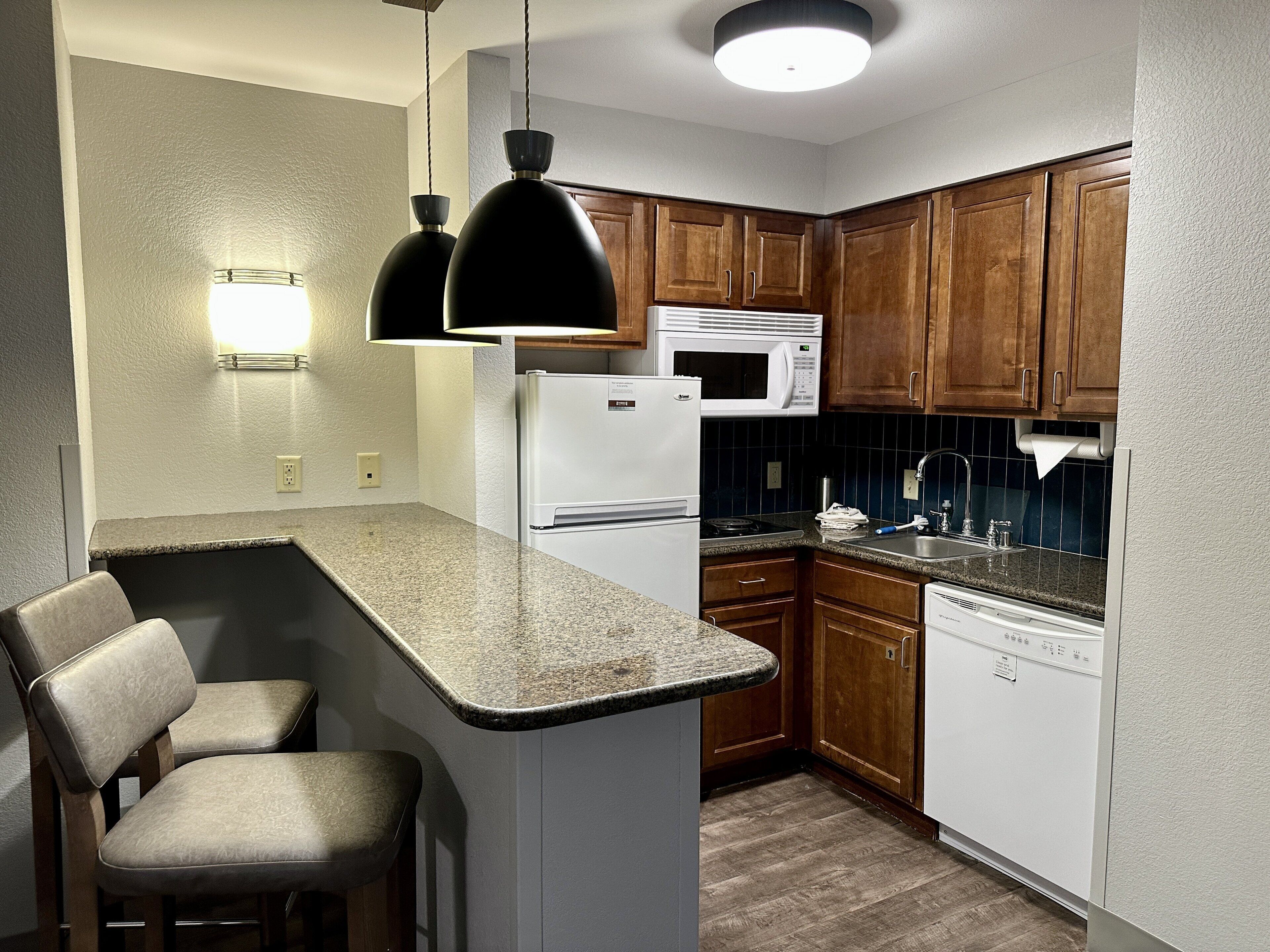 premium bedding, desk, blackout curtains, iron/ironing board