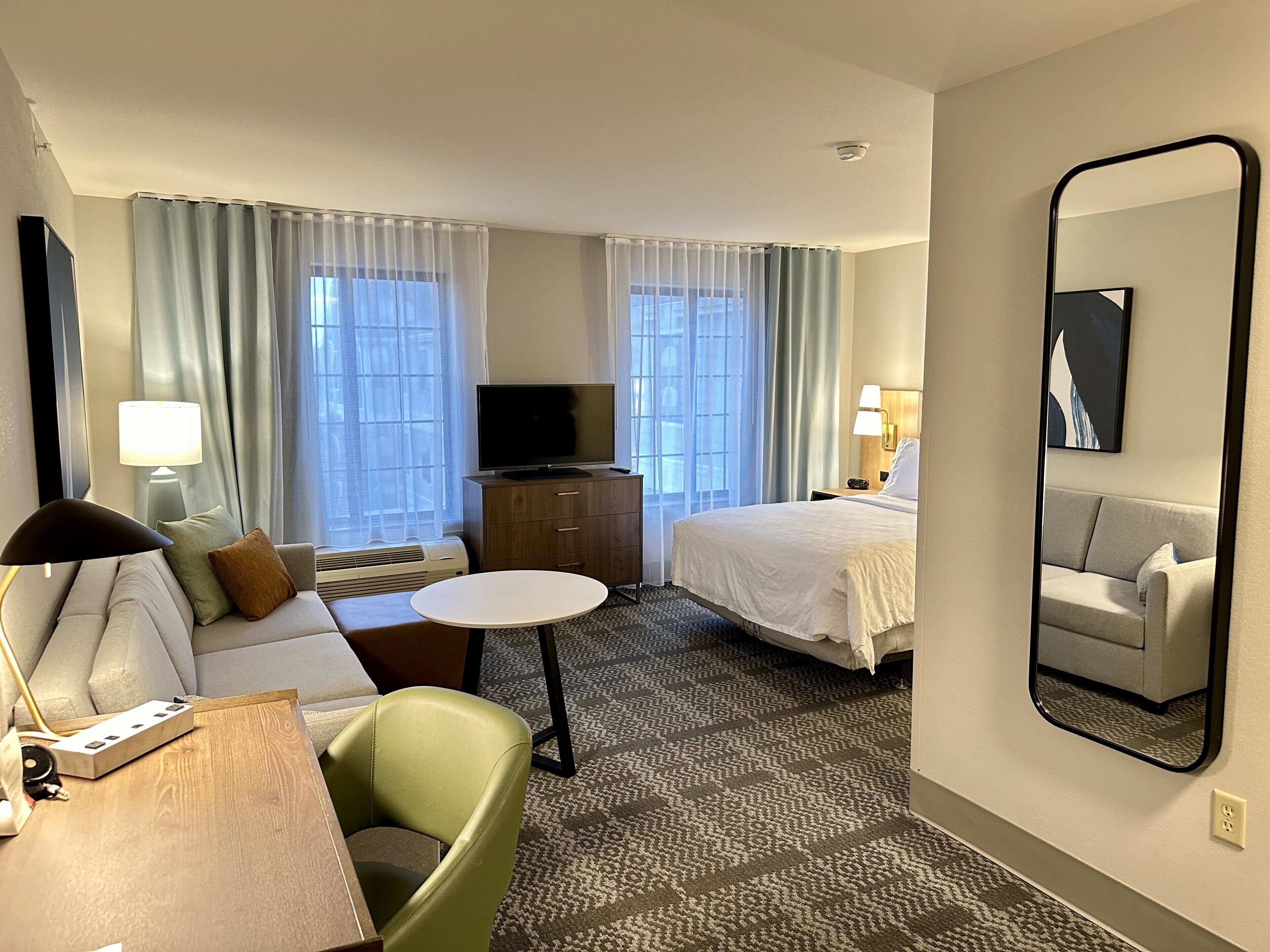 premium bedding, desk, blackout curtains, iron/ironing board