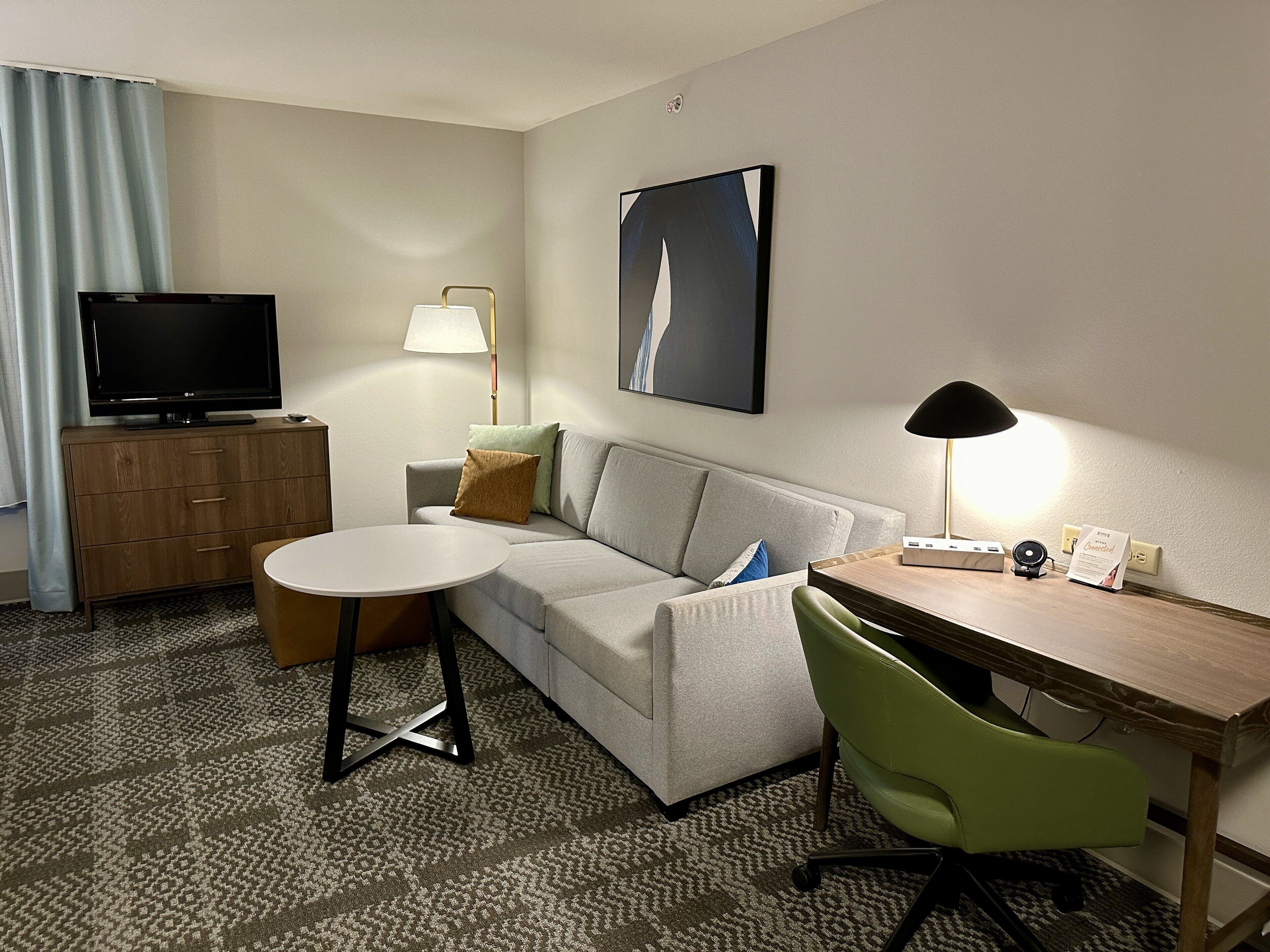 premium bedding, desk, blackout curtains, iron/ironing board