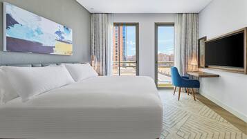 Suite, 1 Bedroom, Kitchen | Down comforters, in-room safe, desk, laptop workspace