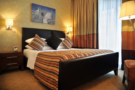 1 bedroom, down comforters, in-room safe, desk
