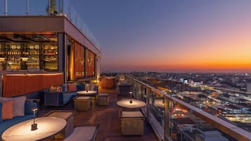 Cocktail bar, poolside views, open daily