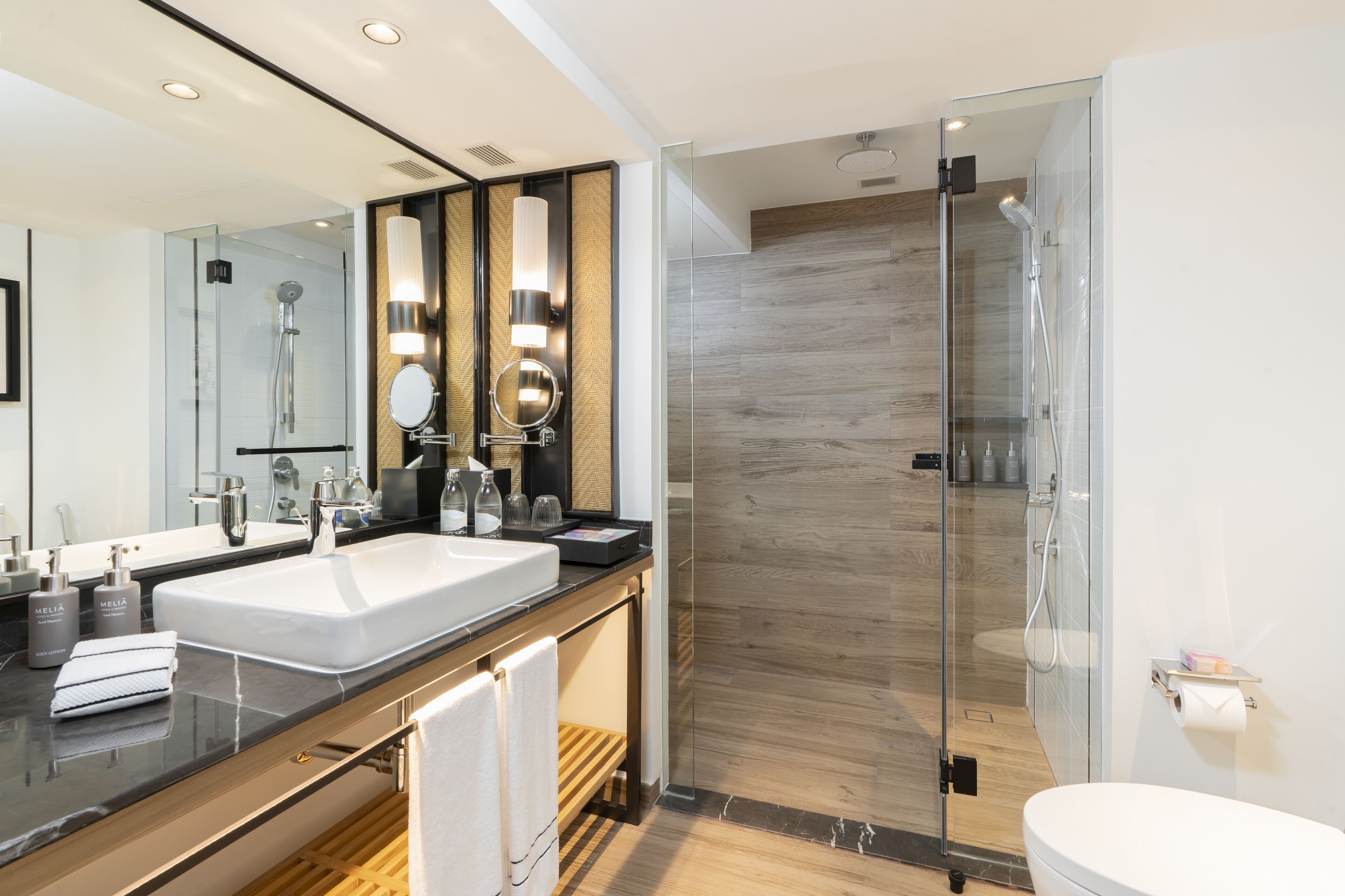 eco-friendly toiletries, hair dryer, bathrobes, slippers