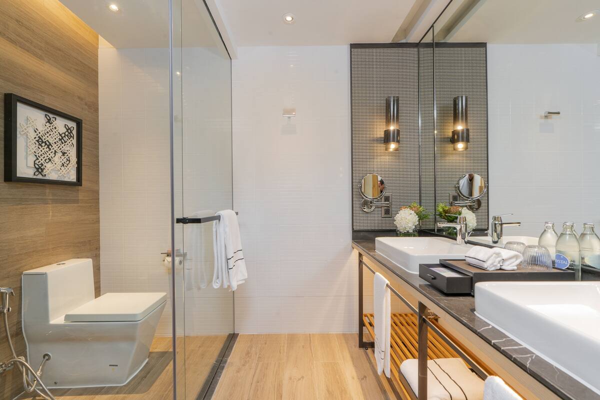 eco-friendly toiletries, hair dryer, bathrobes, slippers