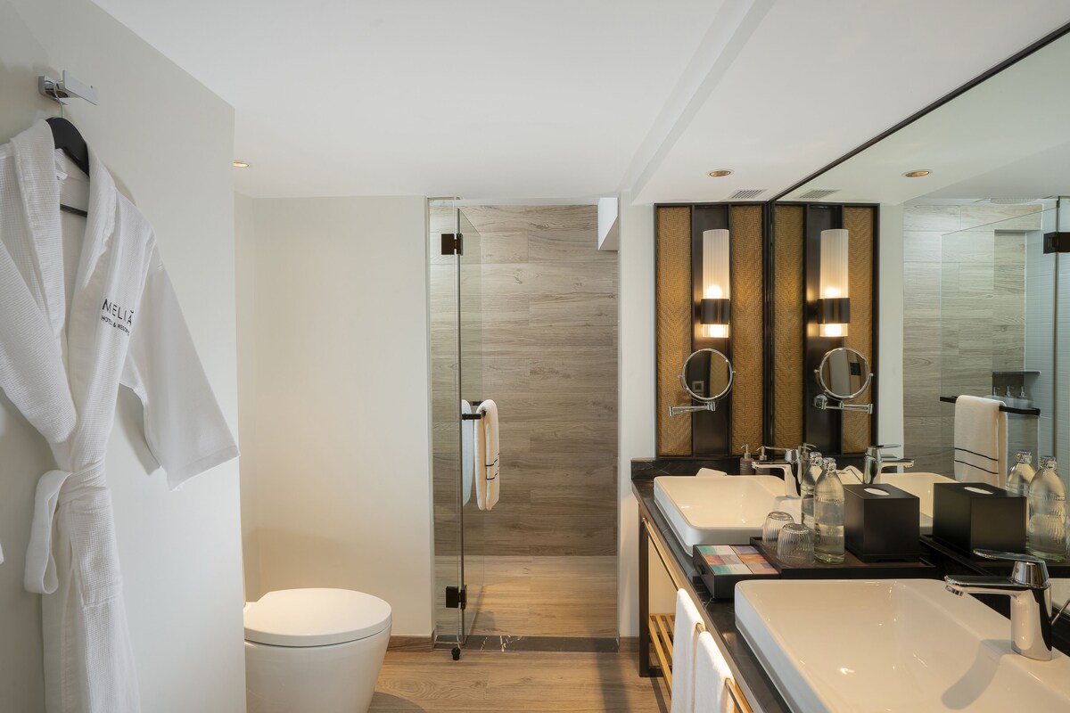 Bathroom | Eco-friendly toiletries, hair dryer, bathrobes, slippers