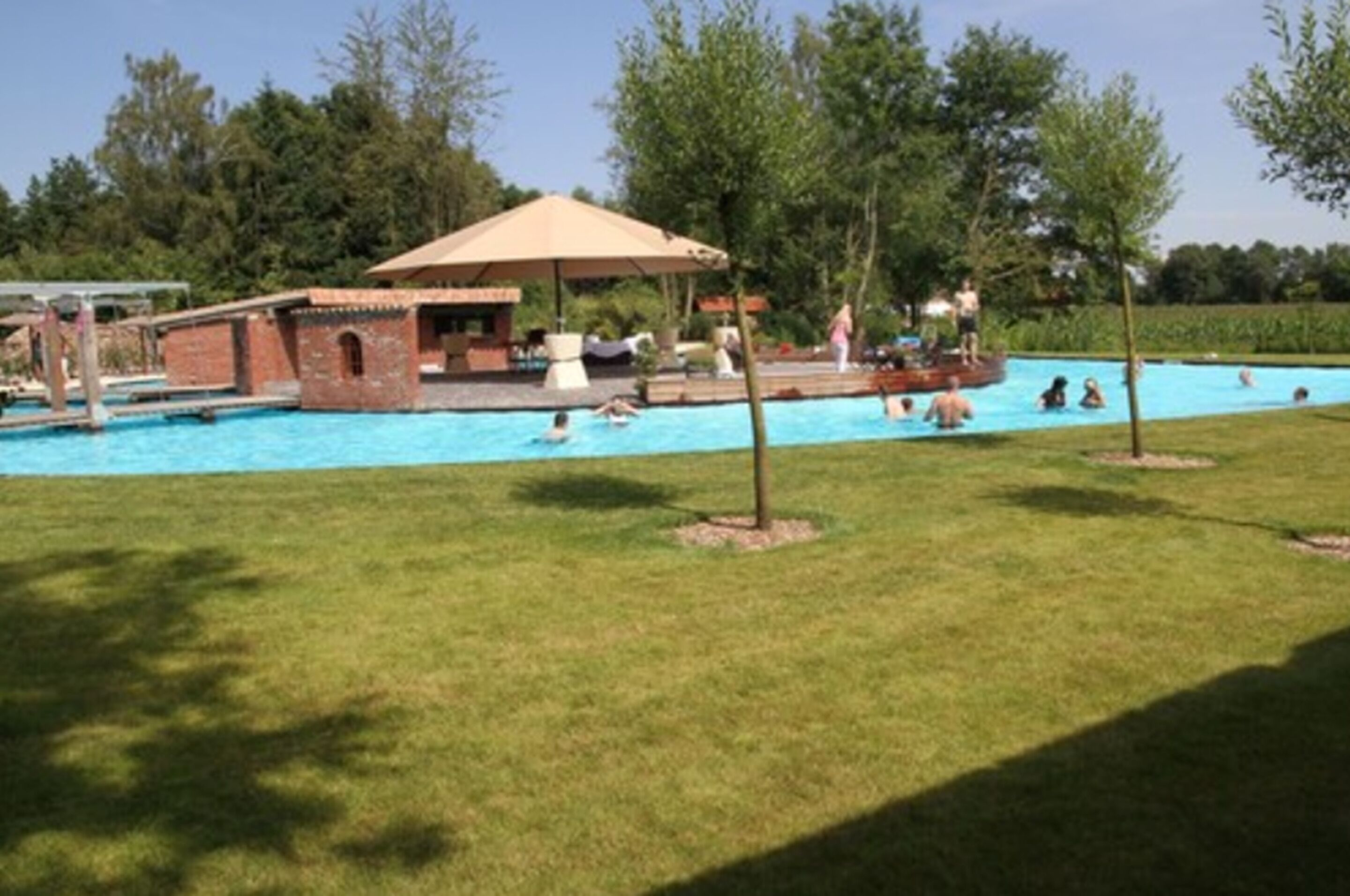 seasonal outdoor pool, open 7:00 am to 10:00 pm, pool umbrellas