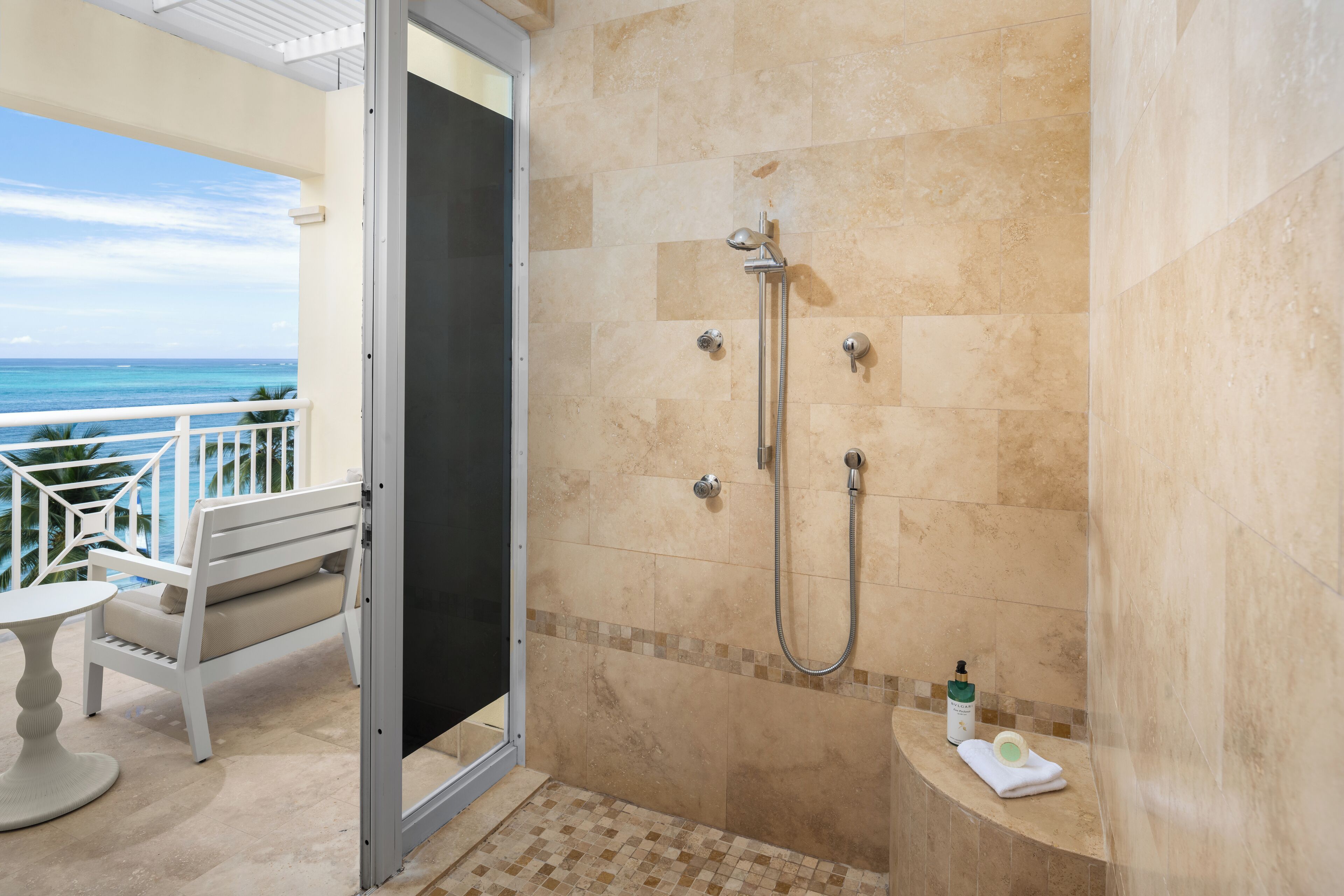 designer toiletries, hair dryer, bathrobes, slippers