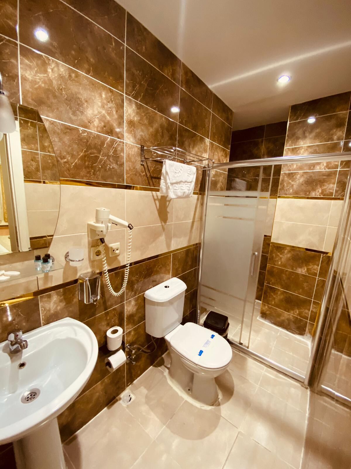 shower, free toiletries, hair dryer, dressing gowns