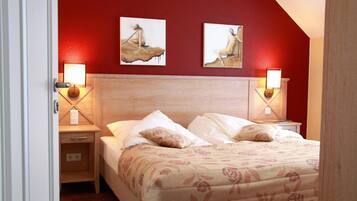 Premium bedding, down duvets, pillow-top beds, blackout curtains