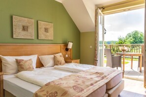 Habitación Confort doble | Ropa de cama de alta calidad y edredones de plumas