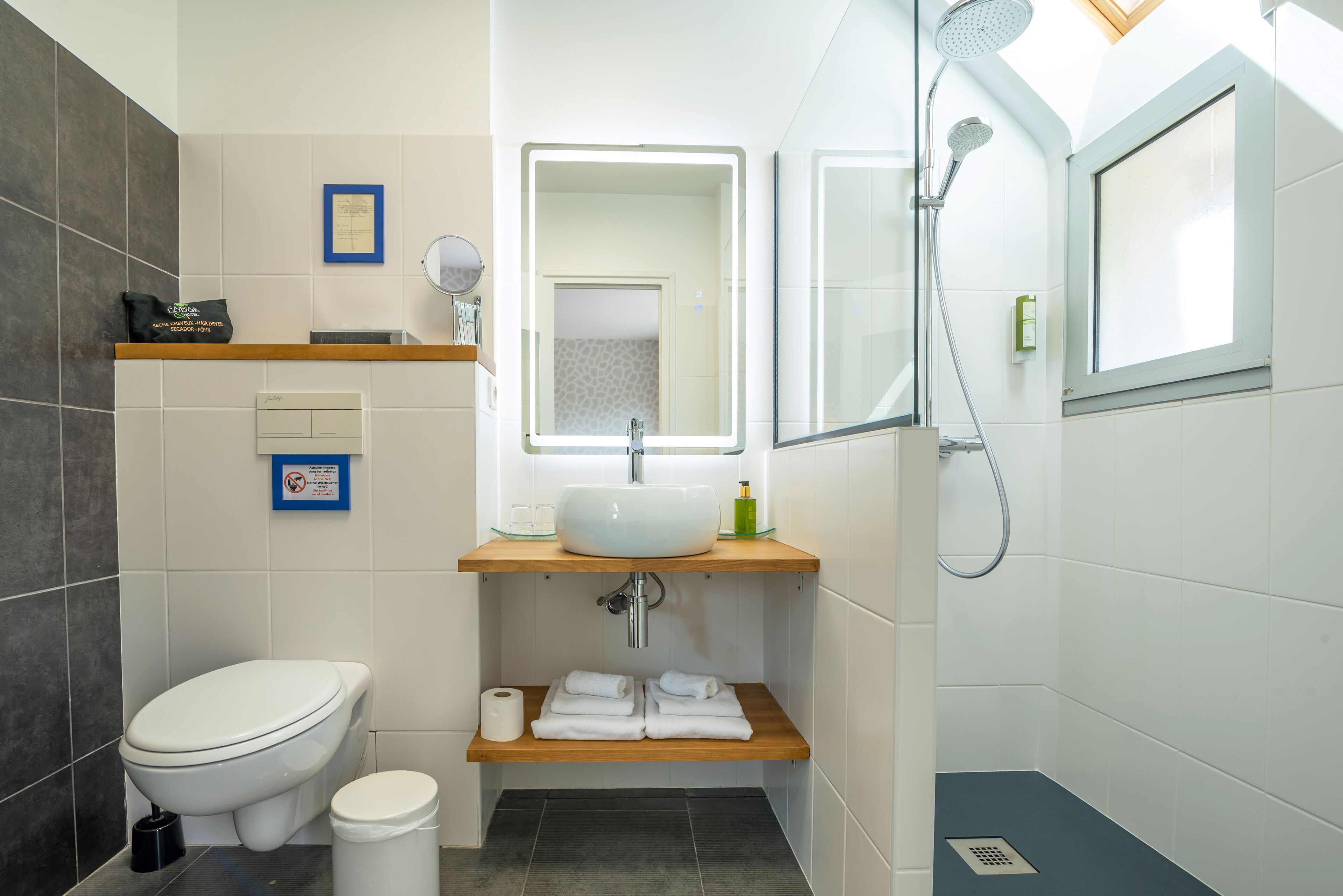 shower, hair dryer, bathrobes, towels