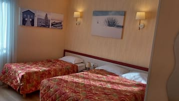 Chambre Triple | Literie de qualité supérieure, bureau, chambres insonorisées