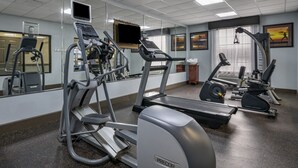 A gym with treadmills, elliptical machines, and a stationary bike. - Best Western Plus Bradenton Gateway Hotel (Bradenton)