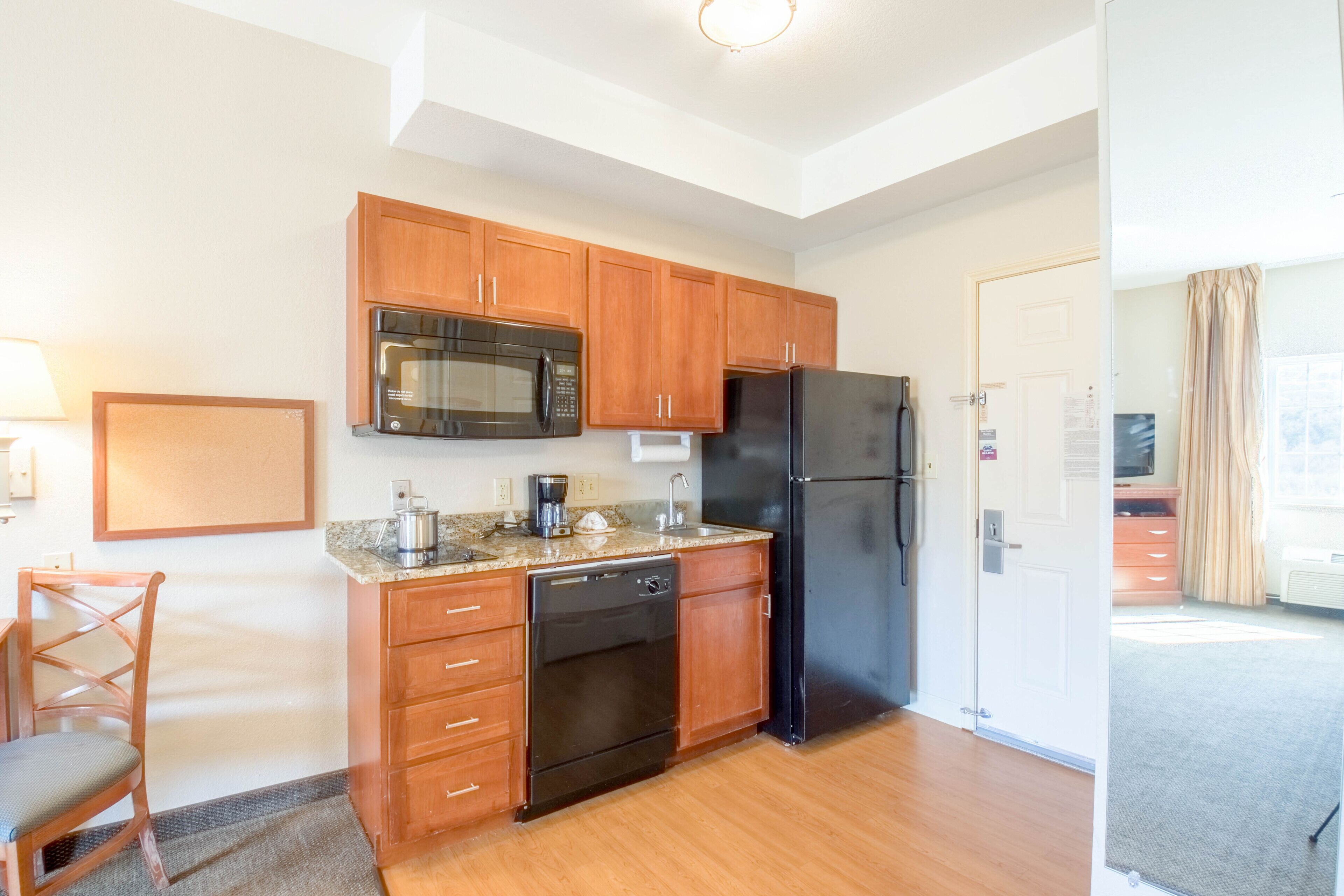 studio suite, 1 king bed | private kitchen | full-sized fridge, microwave, stovetop, dishwasher