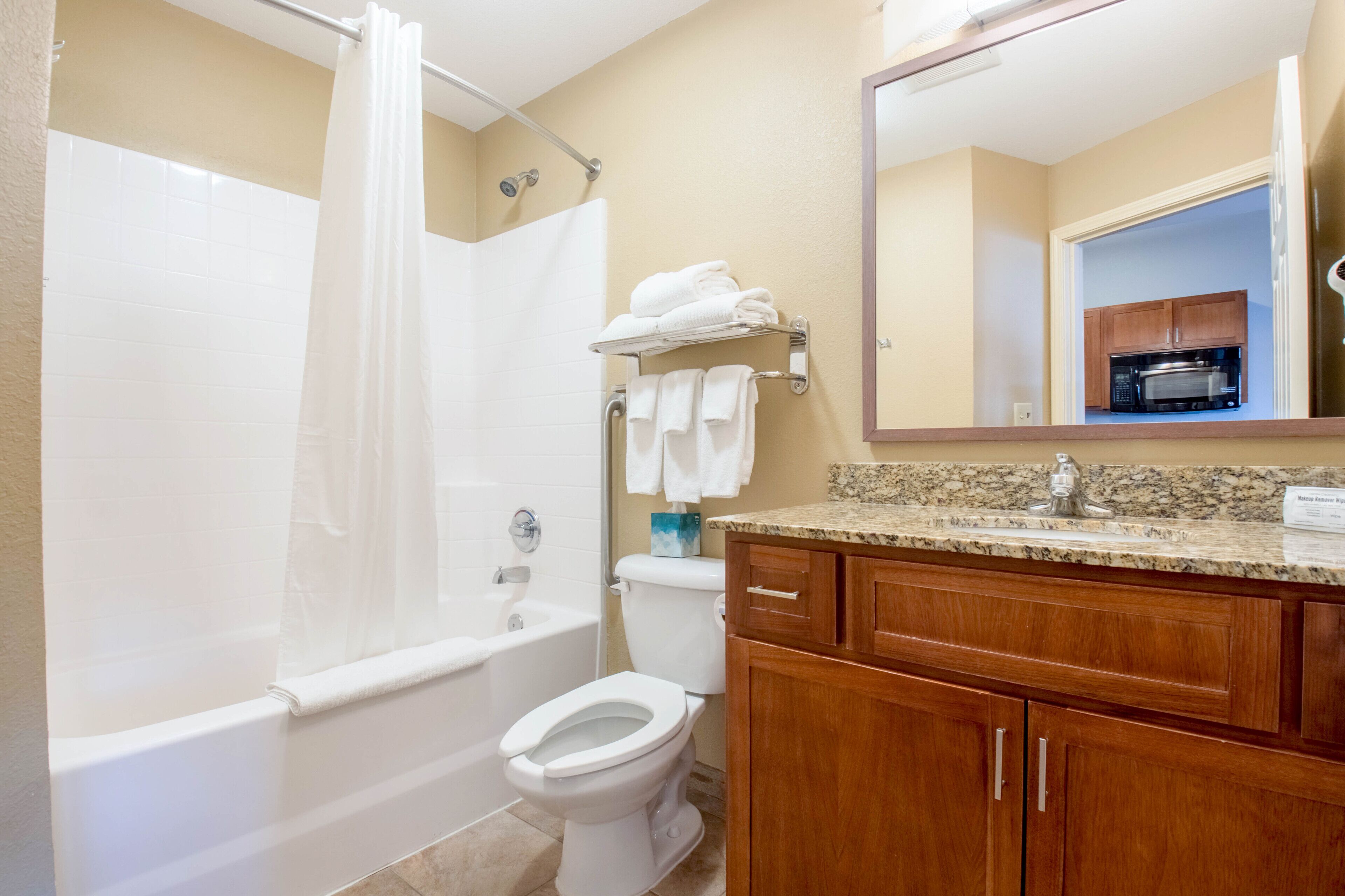 combined shower/bathtub, free toiletries, hair dryer, towels