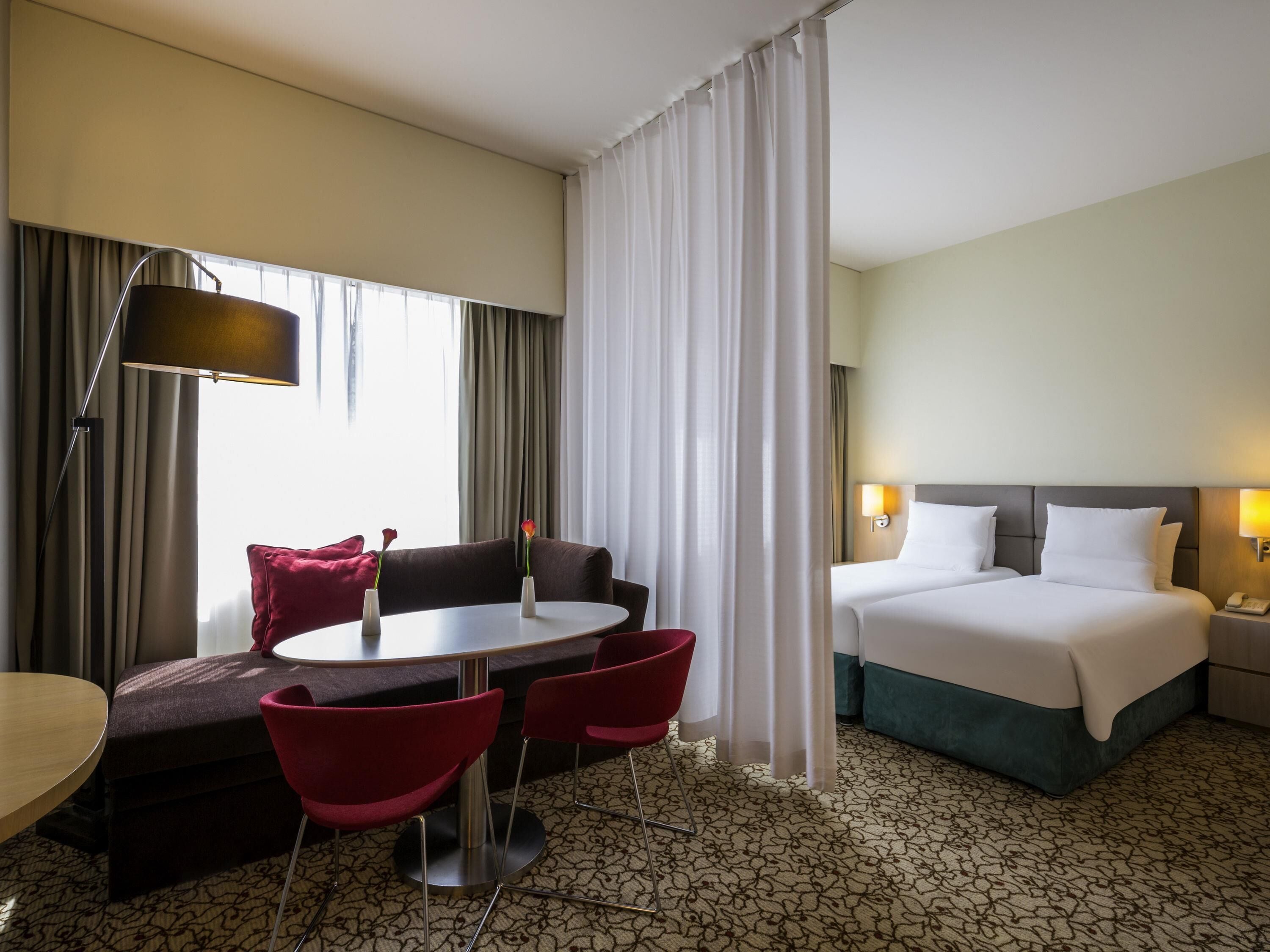 Premium bedding, down duvets, minibar, in-room safe