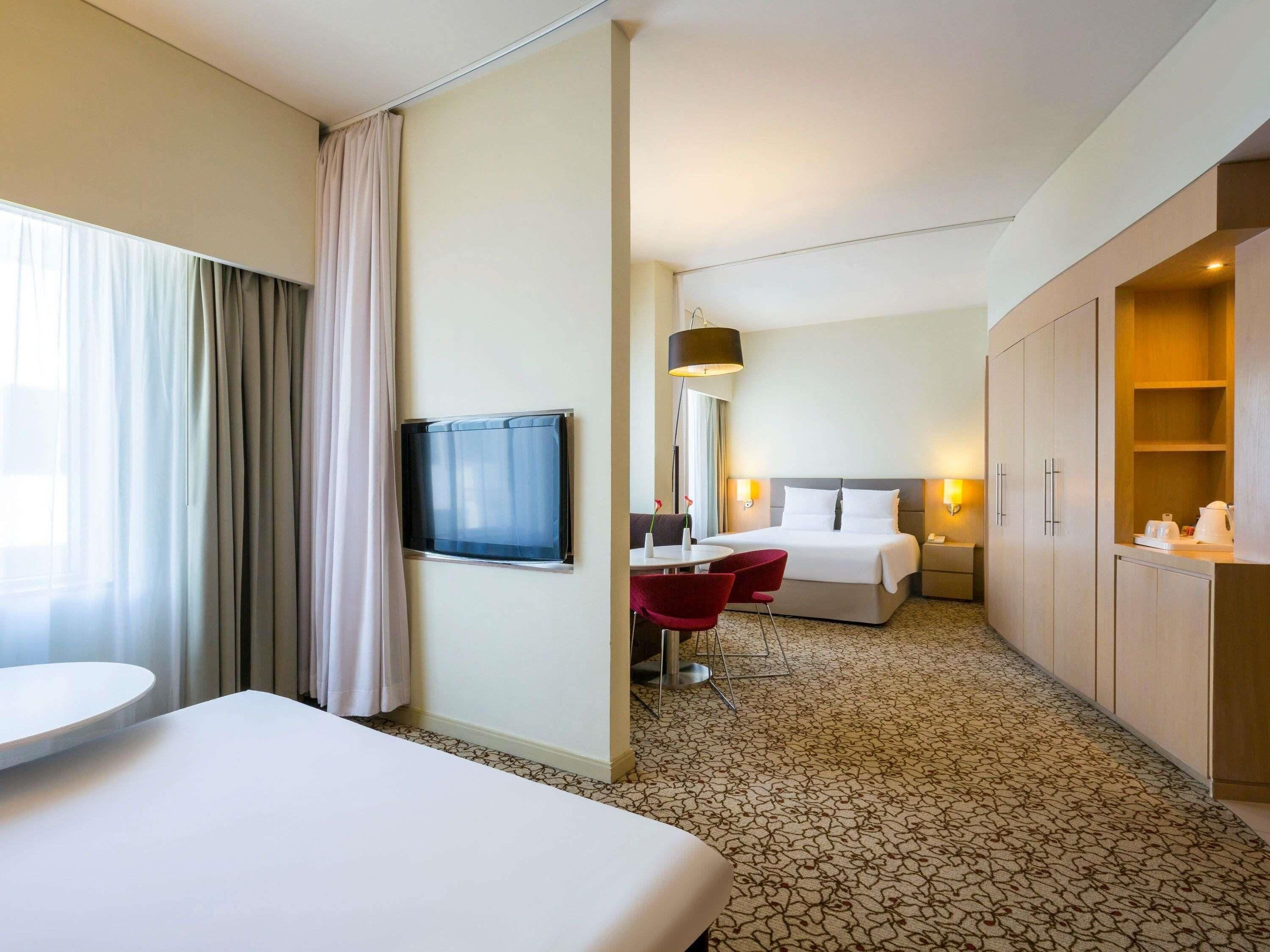 Family Suite, Multiple Beds | Premium bedding, down comforters, minibar, in-room safe