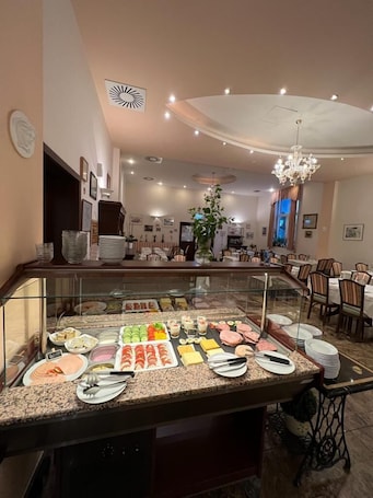 Daily buffet breakfast (EUR 14 per person)