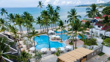 2 outdoor pools, open 7:00 AM to 7:00 PM, pool umbrellas, sun loungers
