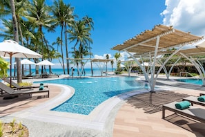 2 outdoor pools, open 7:00 AM to 7:00 PM, pool umbrellas, sun loungers