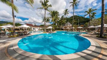 2 outdoor pools, open 7:00 AM to 7:00 PM, pool umbrellas, pool loungers