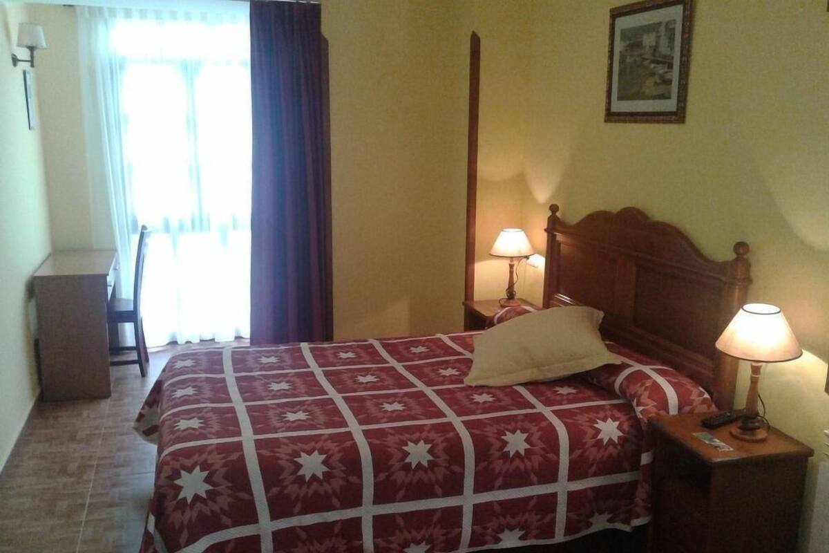 Premium bedding, blackout curtains, cots/infant beds, free WiFi