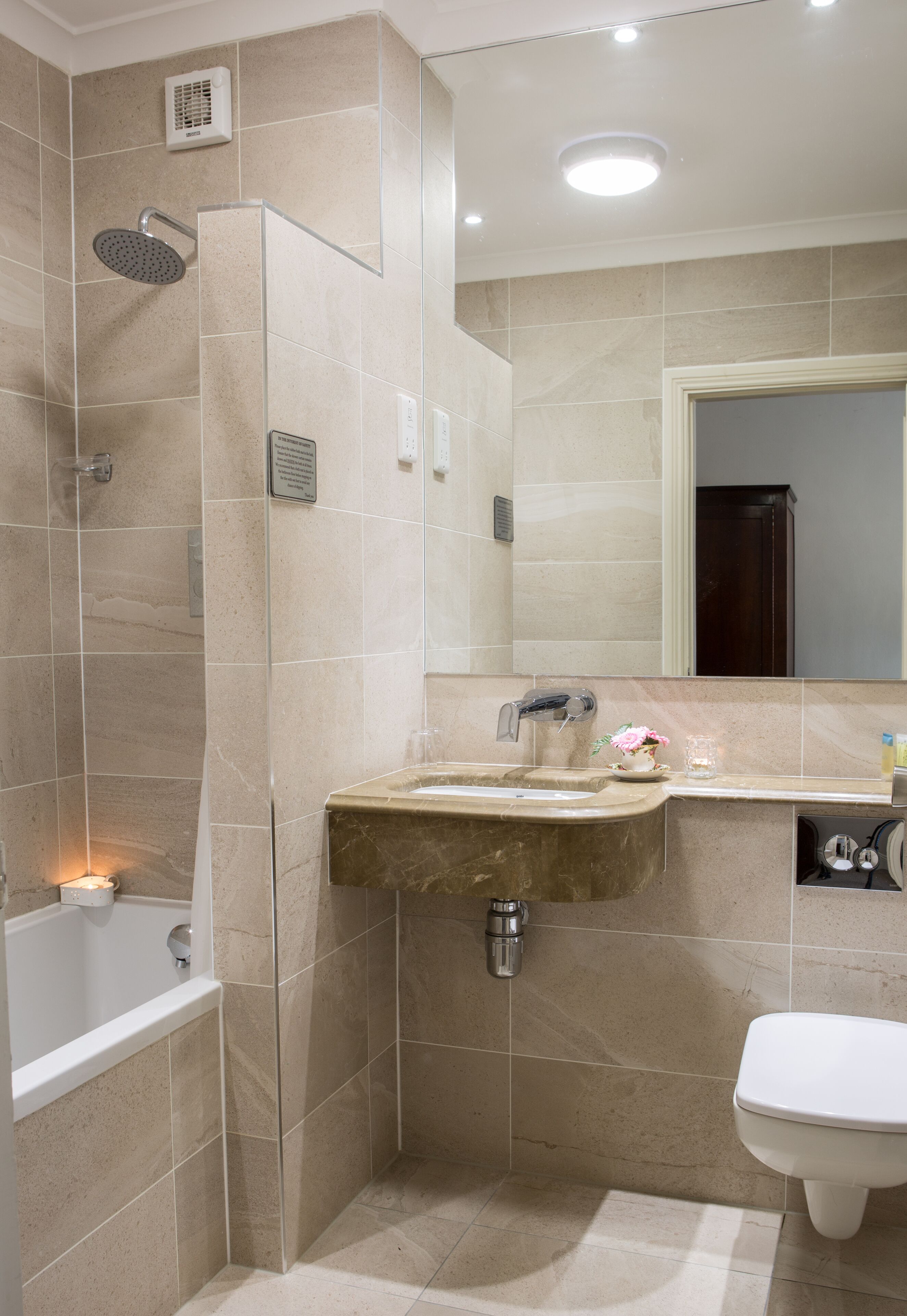 deep-soaking bathtub, free toiletries, hair dryer, towels