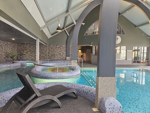 Indoor pool, open 6:30 AM to 9:30 PM, pool loungers
