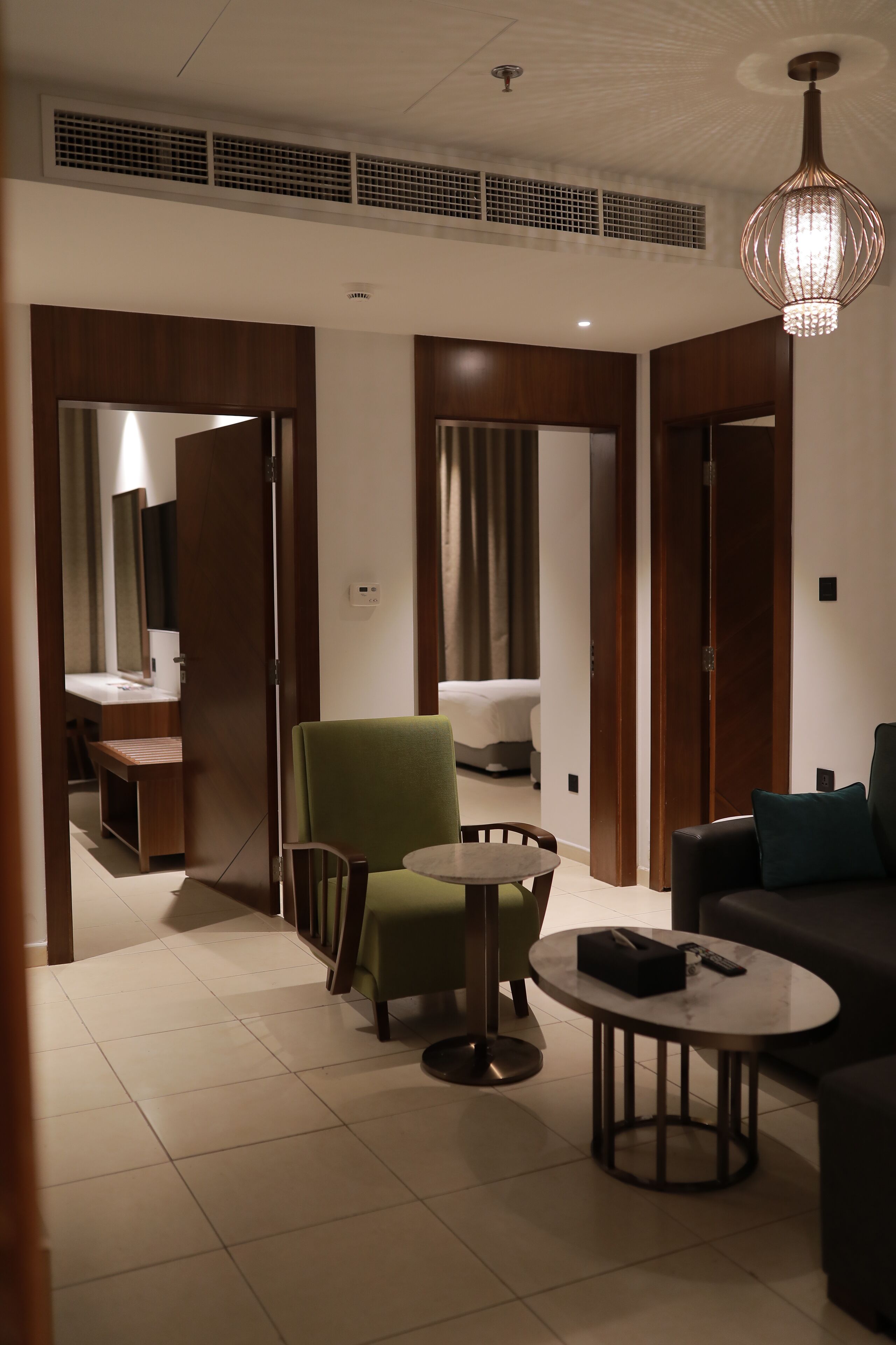 Suite, 2 Bedrooms | Living area | 55-inch Smart TV with satellite channels, printers