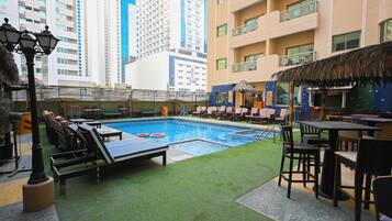 Outdoor pool, sun loungers