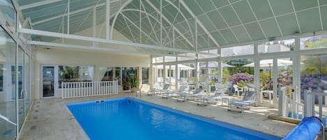 Indoor pool, seasonal outdoor pool, pool loungers