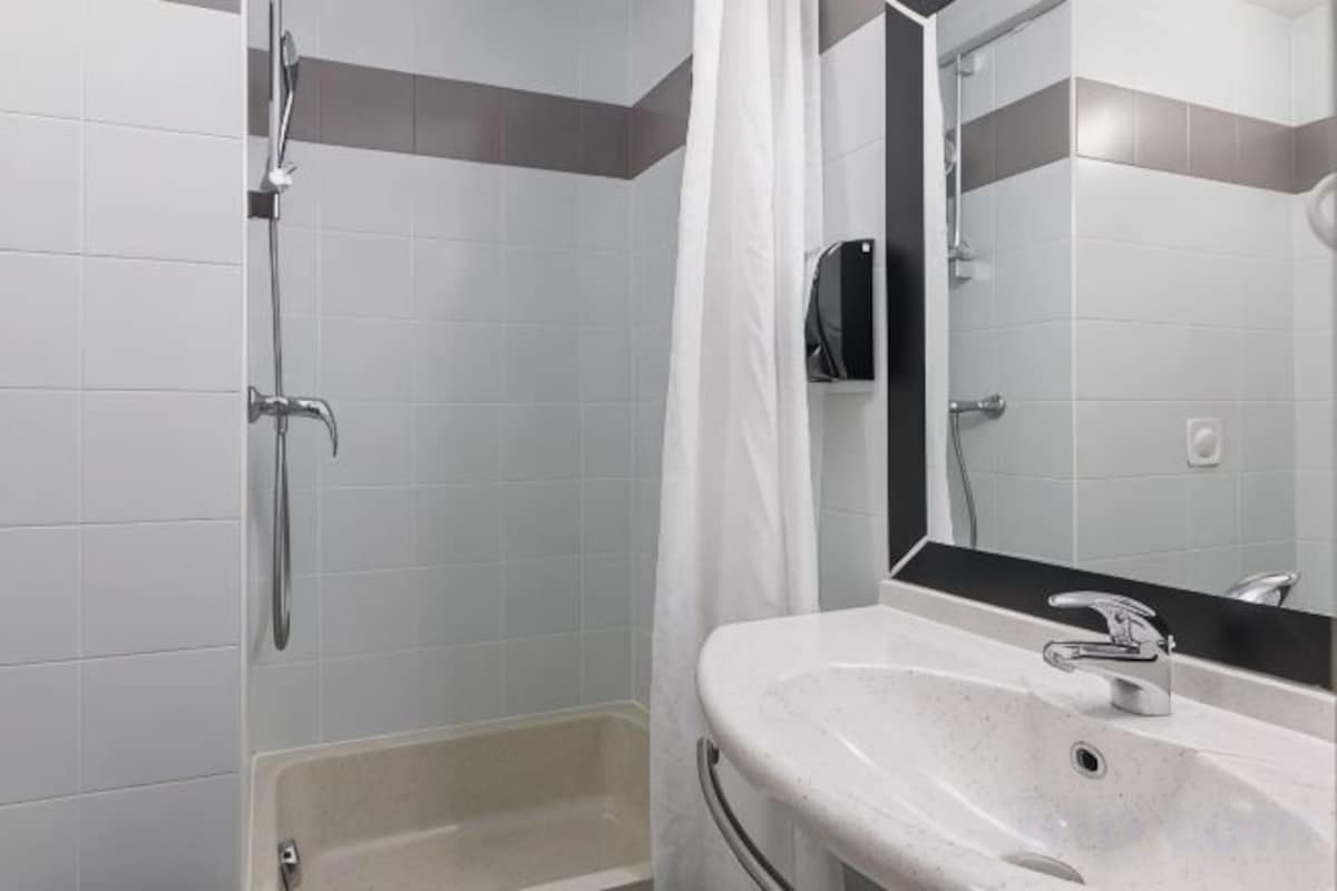 Bathroom | Shower, hair dryer, towels, soap